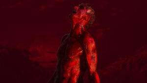 Cult horror icon Bill Oberst Jr. howls in full body makeup as a red devil dripping with slime